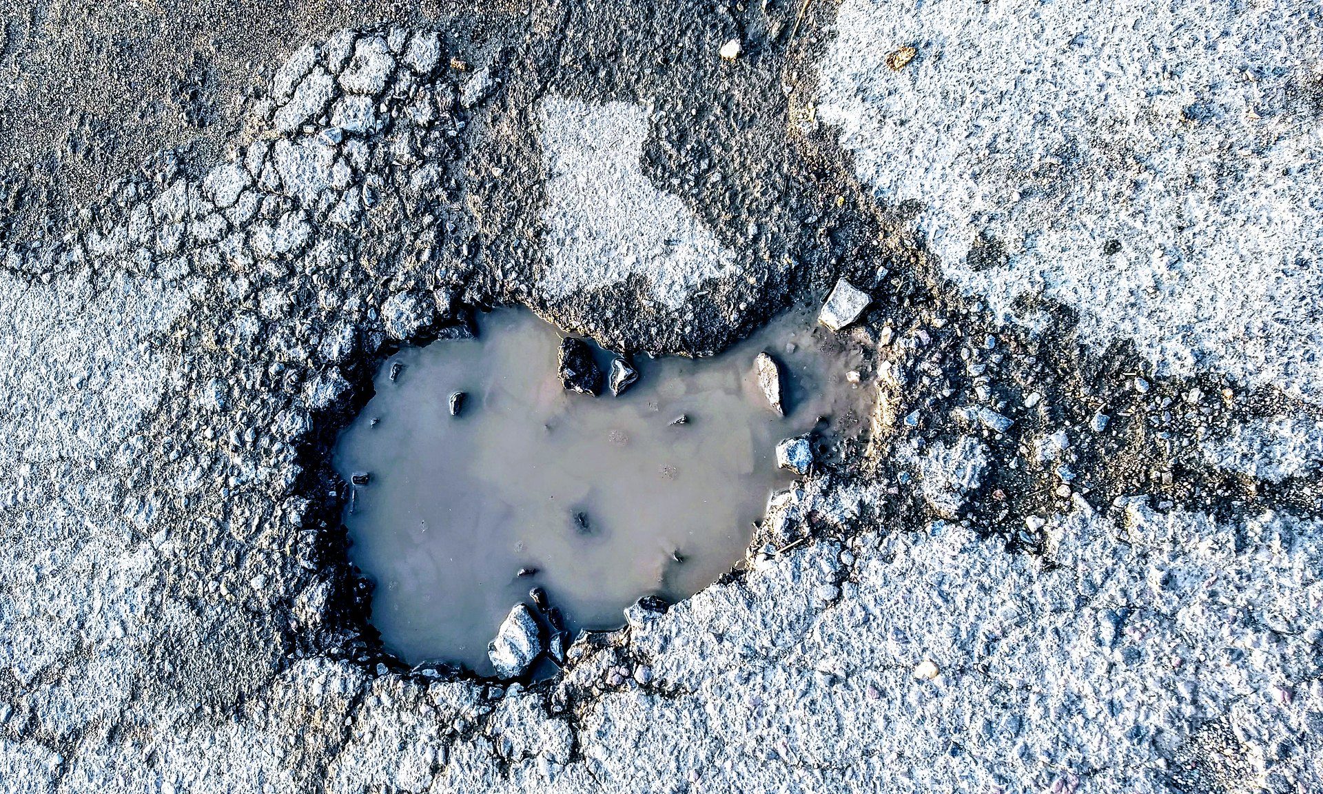 Potholes, road repair, Department of Transportation